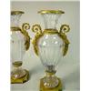 Image 2 : A PAIR OF NEOCLASSICAL STYLE ORMOLU-MOUNTED COLORLESS GLASS DOUBLE-HANDLED URNS