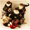 Image 1 : A GROUP OF FOUR HOLIDAY FIGURES