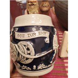 1 German Beer Stein, 1 Clay Vase, 1 Minie Vase, 1 Mini Stone Releif, 2 Figurines