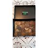 Image 1 : container of large pennies some holed