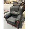 Image 1 : Wood Trimmed Black Leather Sofa Chair
