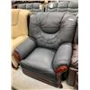 Image 1 : Black Leather Arm Chair with wood trim
