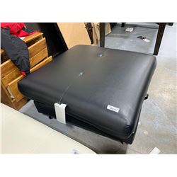 Black Leather Storage Ottoman ( top is crooked)