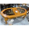 Image 1 : Oak Oval Glass top Coffee Table