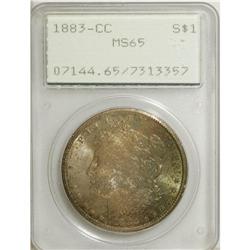 1883-CC S$1 MS65 PCGS. Remarkable canvas bag toning co