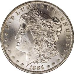 1884-O S$1 MS67 NGC. This Superb specimen is fully bri