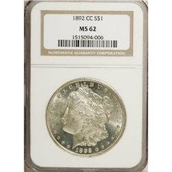 1892-CC S$1 MS62 NGC. Lustrous surfaces show a faint b