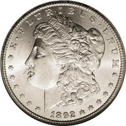 1892-CC S$1 MS65 NGC. A satiny white coin with radiant