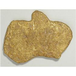 Flat Gold Nugget. This flat nugget that weighs 107 gram