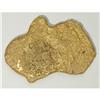 Image 2 : Flat Gold Nugget. This flat nugget that weighs 107 gram