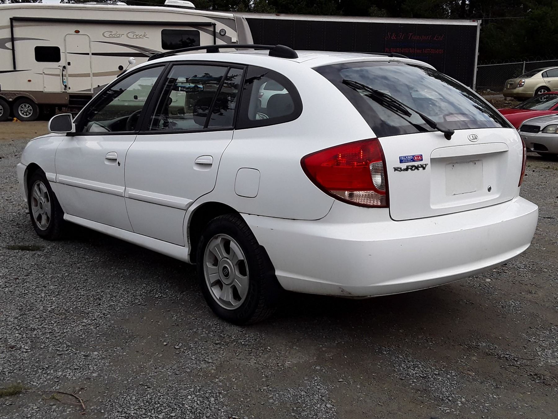 A1 -- 2005 KIA RIO RX-V, WHITE, 77,413 KMS
