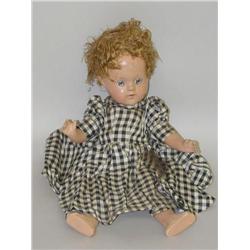 13" COMPOSITION DOLL W/ CLOSED MOUTH W/ OLD PAPER CLOTHING-U