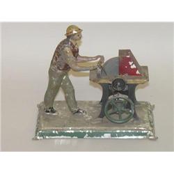 5 1/4" EARLY PAINTED TIN TOY MAN W/ KNIFE GRINDER (19TH CENT