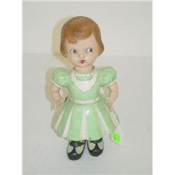 10 1/2" EARLY HARD PLASTIC KEY WIND GIRL ON ROLLERSKATES W/ 