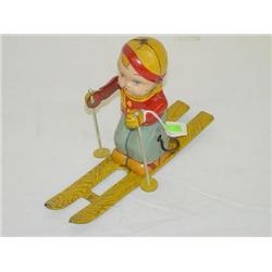 7 1/2" J. CHEIN TIN LITHO WIND-UP BOY ON SKIS