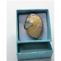 29)  SET IN 925 STAMPED SILVER, FREE FORM