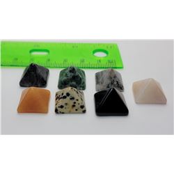16)  LOT OF 7 PYRAMID SHAPED HEALING STONES