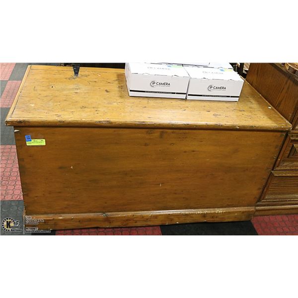 ANTIQUE SOLID WOOD TRUNK ON WHEELS