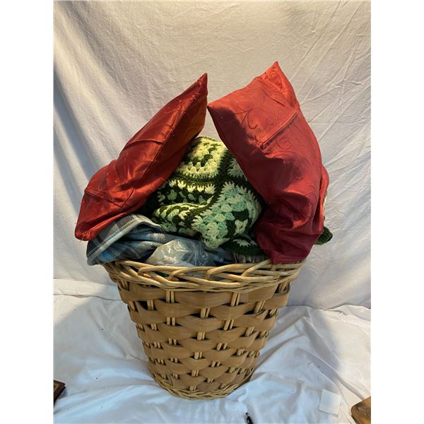 Basket of linens and clothing