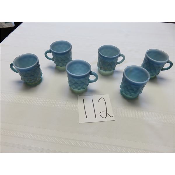 Six blue Fire King cups