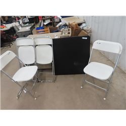 4 Folding Chairs  & Folding Card Table