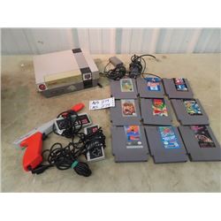 Nintendo Game Consol w Controls & 9 Games