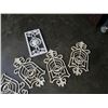 Image 3 : 5 cast iron wall pot holders and Candle stand