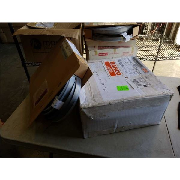 Two boxes of new bandsaw blades