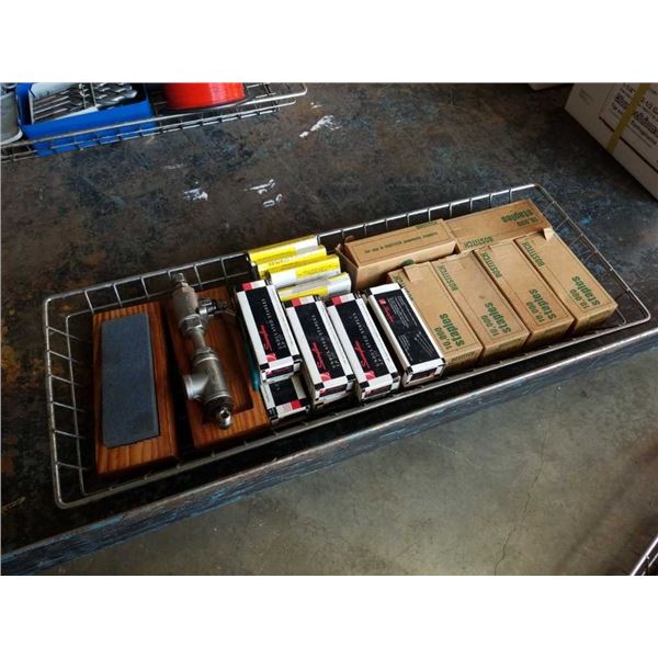 Tray of Staples and sharpening stone