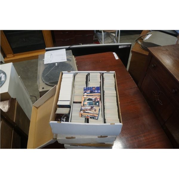 4 large boxes of sports cards