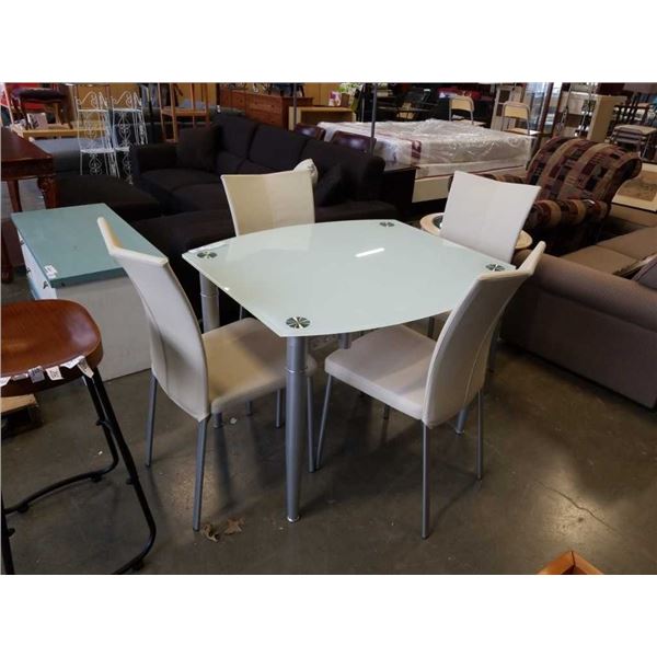 GLASSTOP DINING TABLE WITH SWIVEL OUT LEAFS AND 4 LEATHER CHAIRS RETAIL $1899