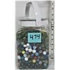 Image 1 : Plastic jar full of marbles, assortment
