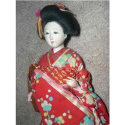 Japanese doll in original attire #1568772