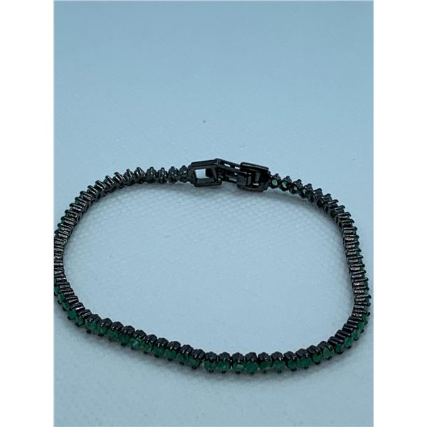 Ladies Natural Emerald Tennis Bracelet 7.38 ct with appraisal certificate of $1300.00