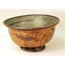 A CIRCULAR COPPER STRAINER