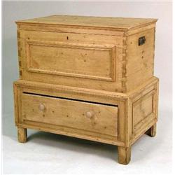 A PANELED PINE MULE CHEST ON FRAME