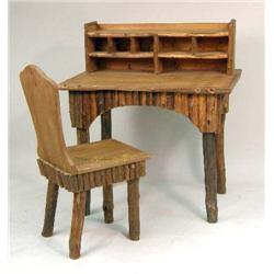 A RUSTIC CEDAR AND PINE WRITING DESK AND CHAIR