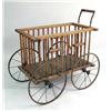 Image 1 : A VICTORIAN METAL AND PINE BABY CARRIAGE