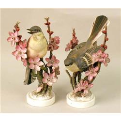 A PAIR OF POLYCHROME PORCELAIN MOCKING BIRDS