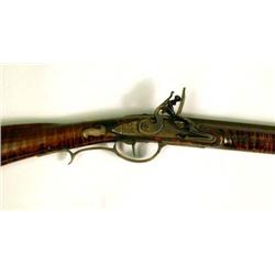 AN ENGRAVED METAL MOUNTED FIGURED MAPLE FLINTLOCK KENTUCKY RIFLE