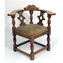A PROVINCIAL OAK ROUNDABOUT CHAIR
