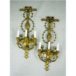 A PAIR OF GEORGE III STYLE PATINATED METAL AND GILTWOOD THREE-LIGHT WALL SCONCES