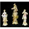 Image 1 : A GROUP OF THREE POLYCHROME DECORATED PORCELAIN FIGURES