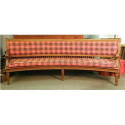 A VICTORIAN CARVED CHERRYWOOD CONCAVE BENCH