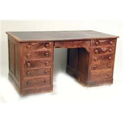 A VICTORIAN LEATHER-INSET MAHOGANY DESK