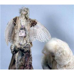 A GROUP OF THREE MIXED MEDIA COMPOSITION FIGURES