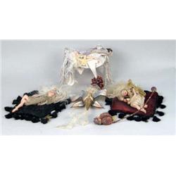 A GROUP OF FOUR MIXED MEDIA COMPOSITION FAIRIES