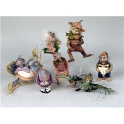 A GROUP OF SEVEN POLYCHROME DECORATED COMPOSITION FIGURES