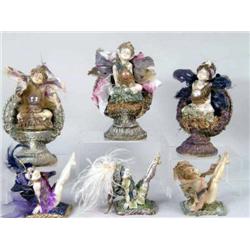 A GROUP OF SIX MIXED MEDIA COMPOSITION FIGURES