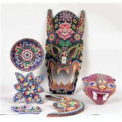 A CARVED WOOD BEAD DECORATED TABLE ARTICLES